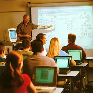 Trainer in front of a classroom